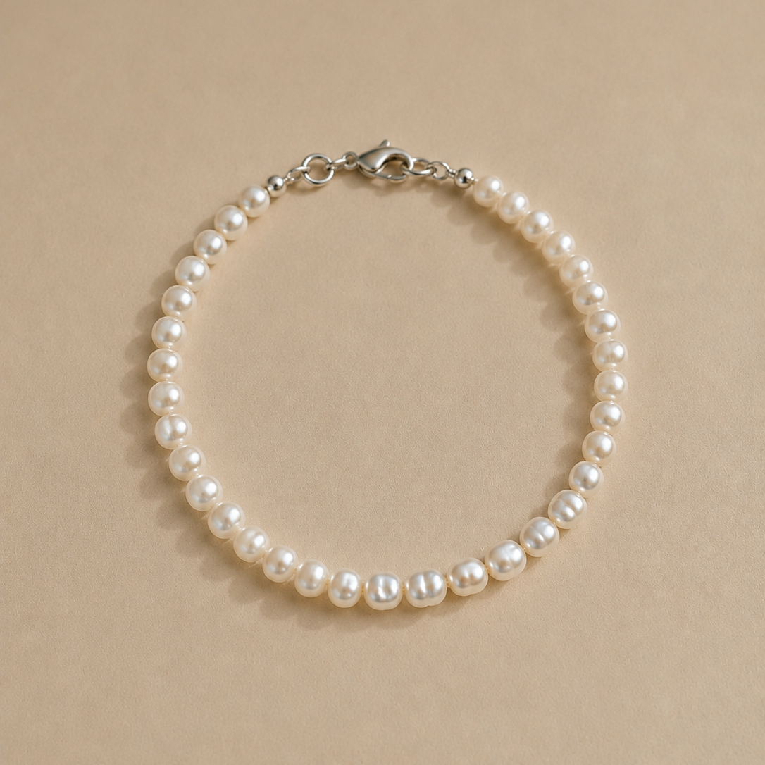 Lulu Bracelet by Ryã Atelier featuring petite 4mm freshwater pearls with sterling silver clasp. 