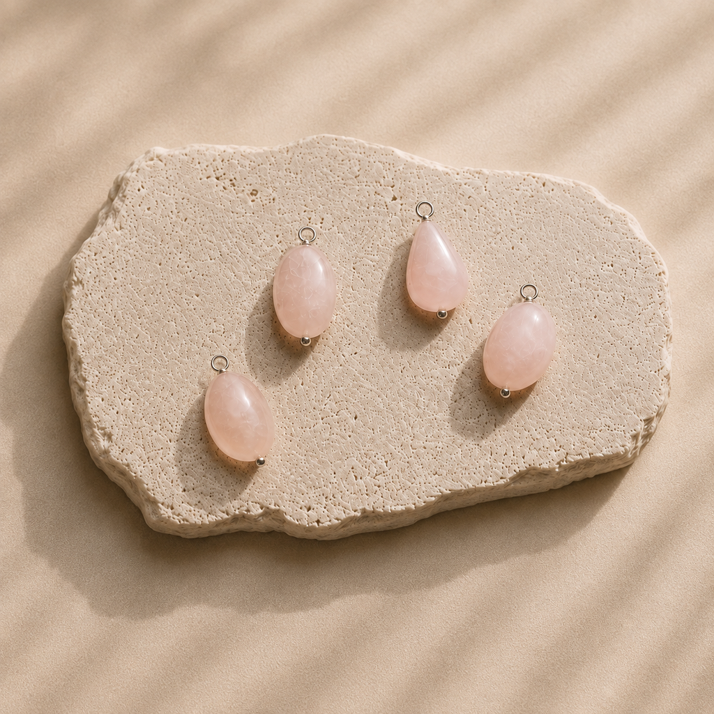 Rosa Pendant collection, from Rya Atelier, handcrafted from a natural Rose Quartz drop bead with a sterling silver ball head pin and round pendant loop. 