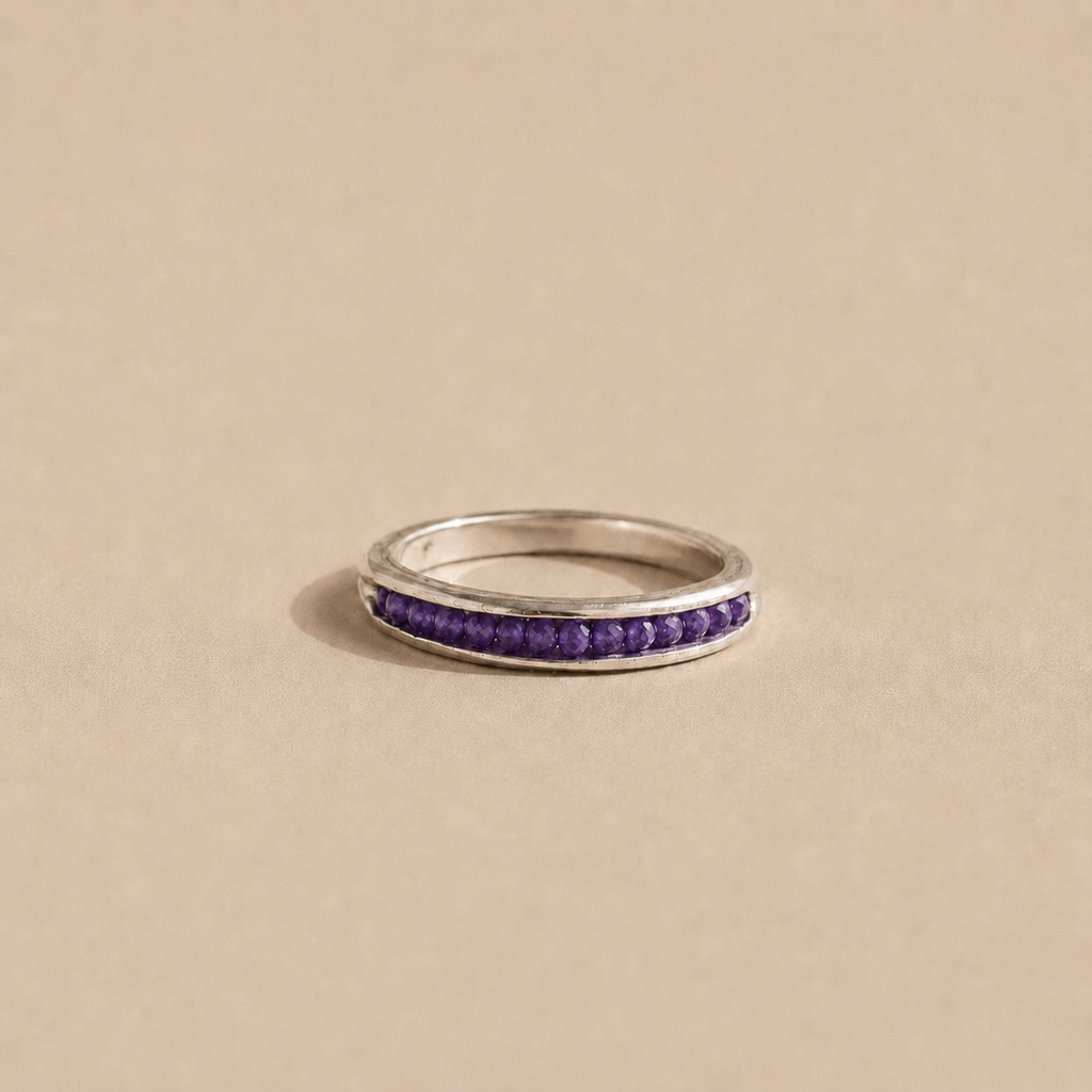 The Izimbewu Amethyst Ring from Rya Atelier. Amethyst beads set in a solid sterling silver pod ring. 