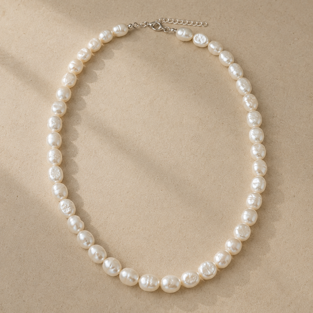 Nolwazi Necklace by Ryã Atelier featuring a strand of natural freshwater baroque pearls measuring approximately 9–12mm