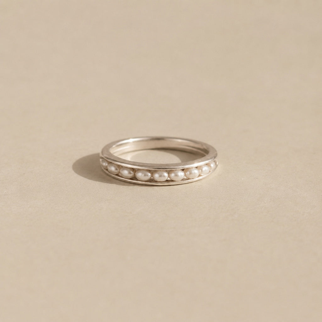 The Izimbewu Pearl Ring from Rya Atelier. Freshwater Pearl beads set in a solid sterling silver pod ring. 