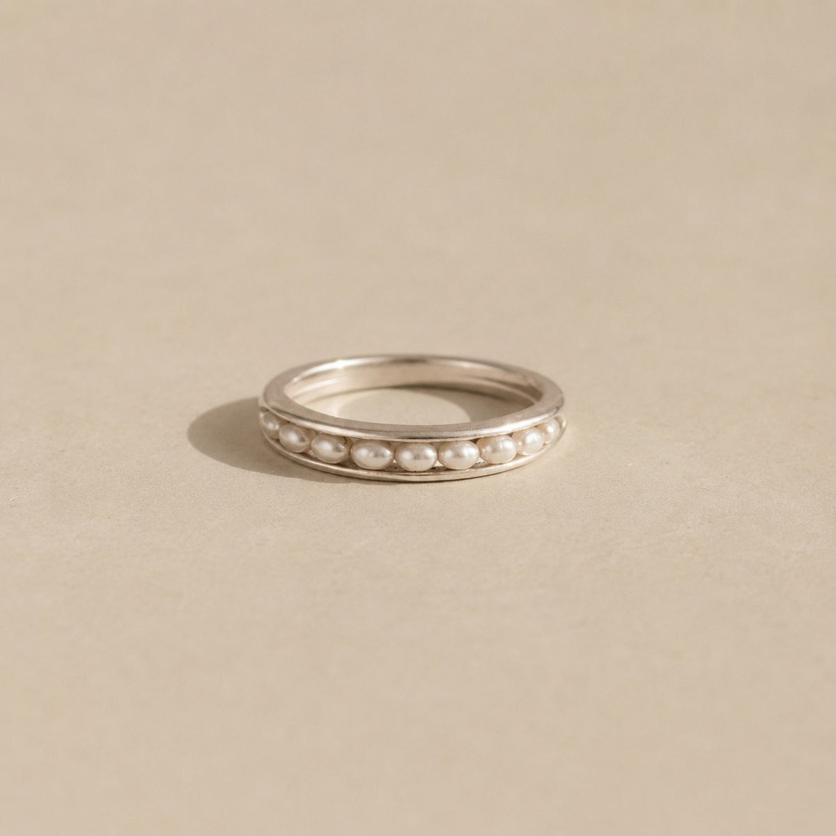 The Izimbewu Pearl Ring from Rya Atelier. Freshwater Pearl beads set in a solid sterling silver pod ring. 