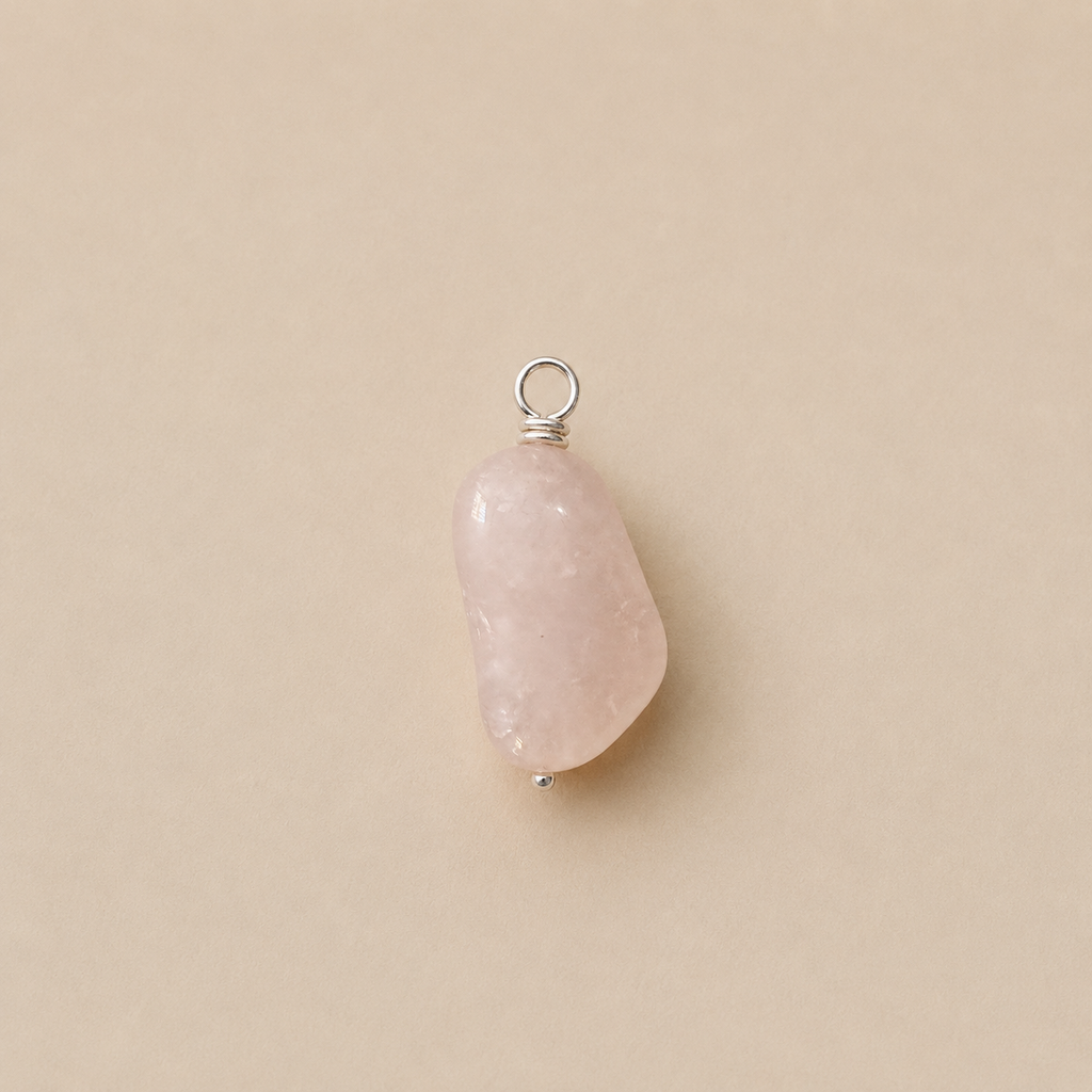 Rosa Pendant, from Rya Atelier, handcrafted from a natural Rose Quartz drop bead with a sterling silver ball head pin and round pendant loop. 