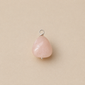 Rosa Pendant handcrafted from a natural Rose Quartz drop bead with a sterling silver ball head pin and round pendant loop on Ryã Atelier's signature oatmeal background.