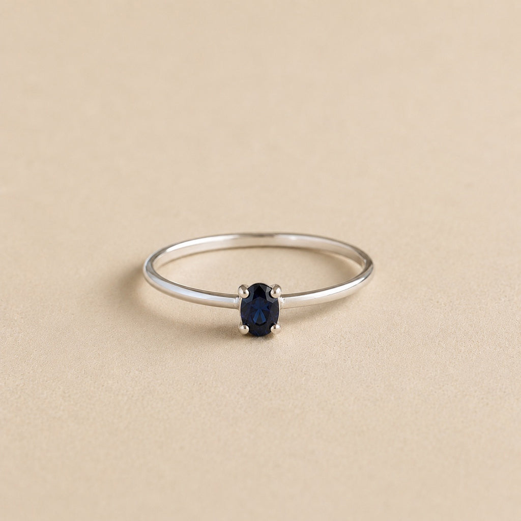 Amani Ring handcrafted in solid 925 sterling silver featuring a natural oval sapphire in a four-claw solitaire setting by Ryã Atelier.