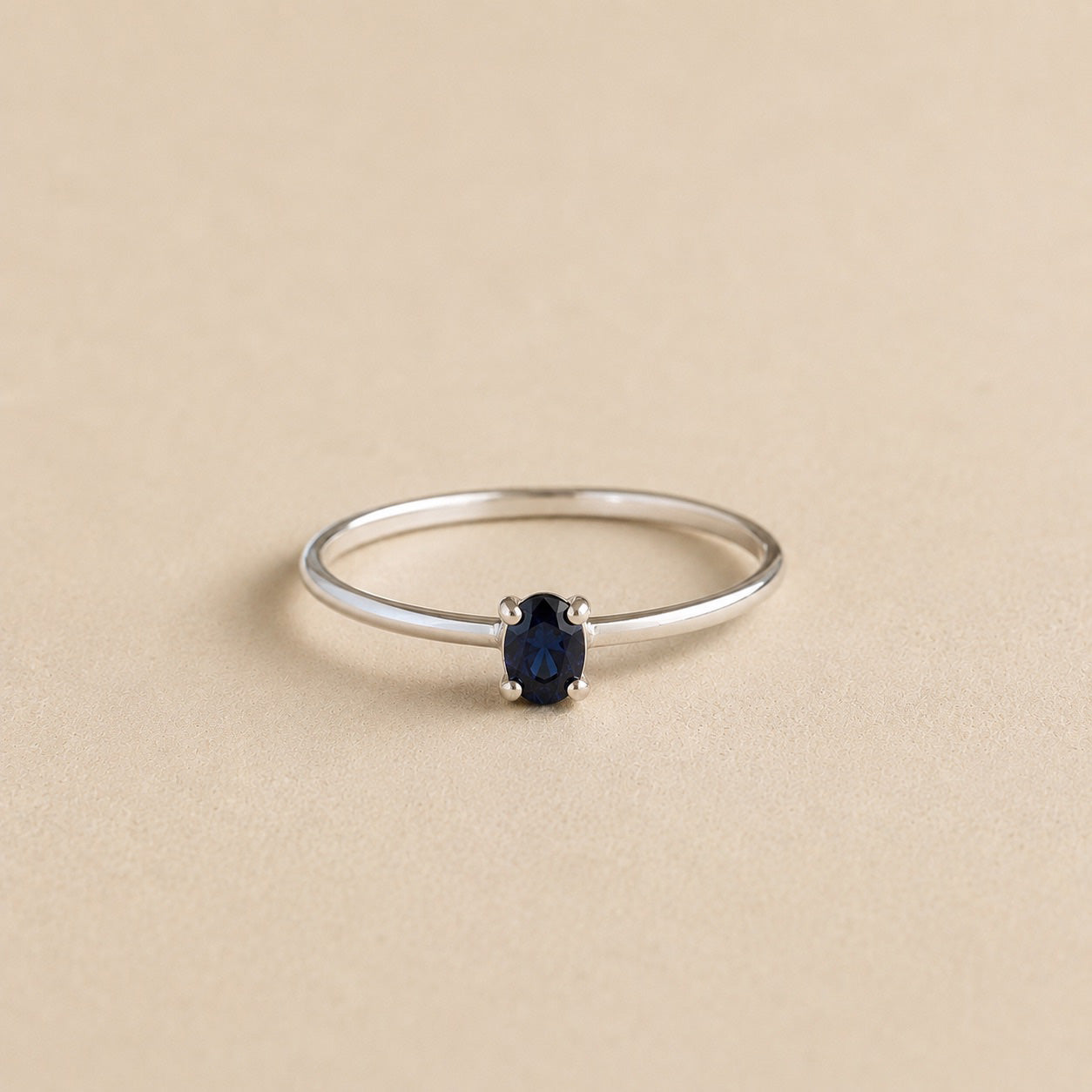 Amani Ring handcrafted in solid 925 sterling silver featuring a natural oval sapphire in a four-claw solitaire setting by Ryã Atelier.