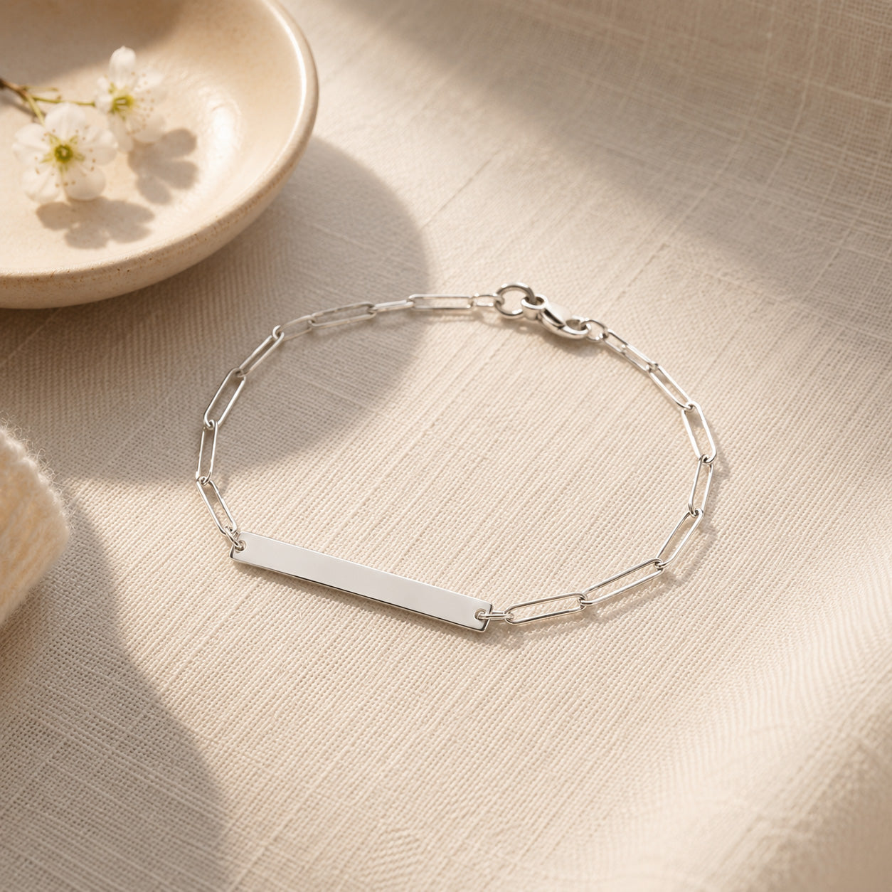 Solid 925 sterling silver paperclip bracelet with engraving plate by Ryā Atelier.