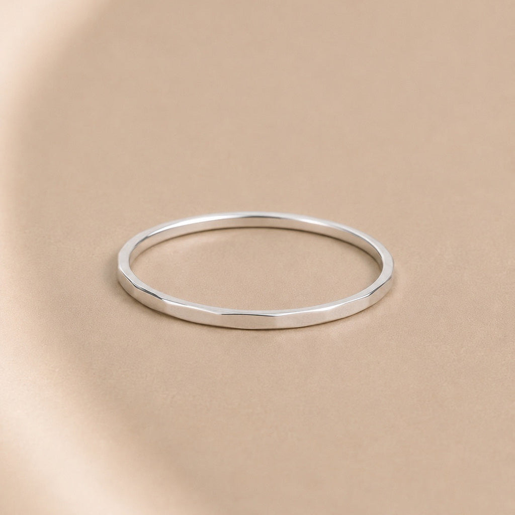 Asanda Thick Ring handcrafted in solid 925 sterling silver featuring a hand-hammered faceted stacking band by Ryã Atelier.