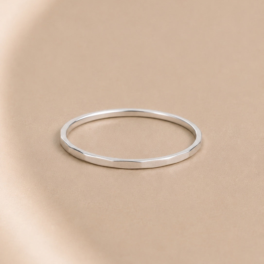 Asanda Thick Ring handcrafted in solid 925 sterling silver featuring a hand-hammered faceted stacking band by Ryã Atelier.