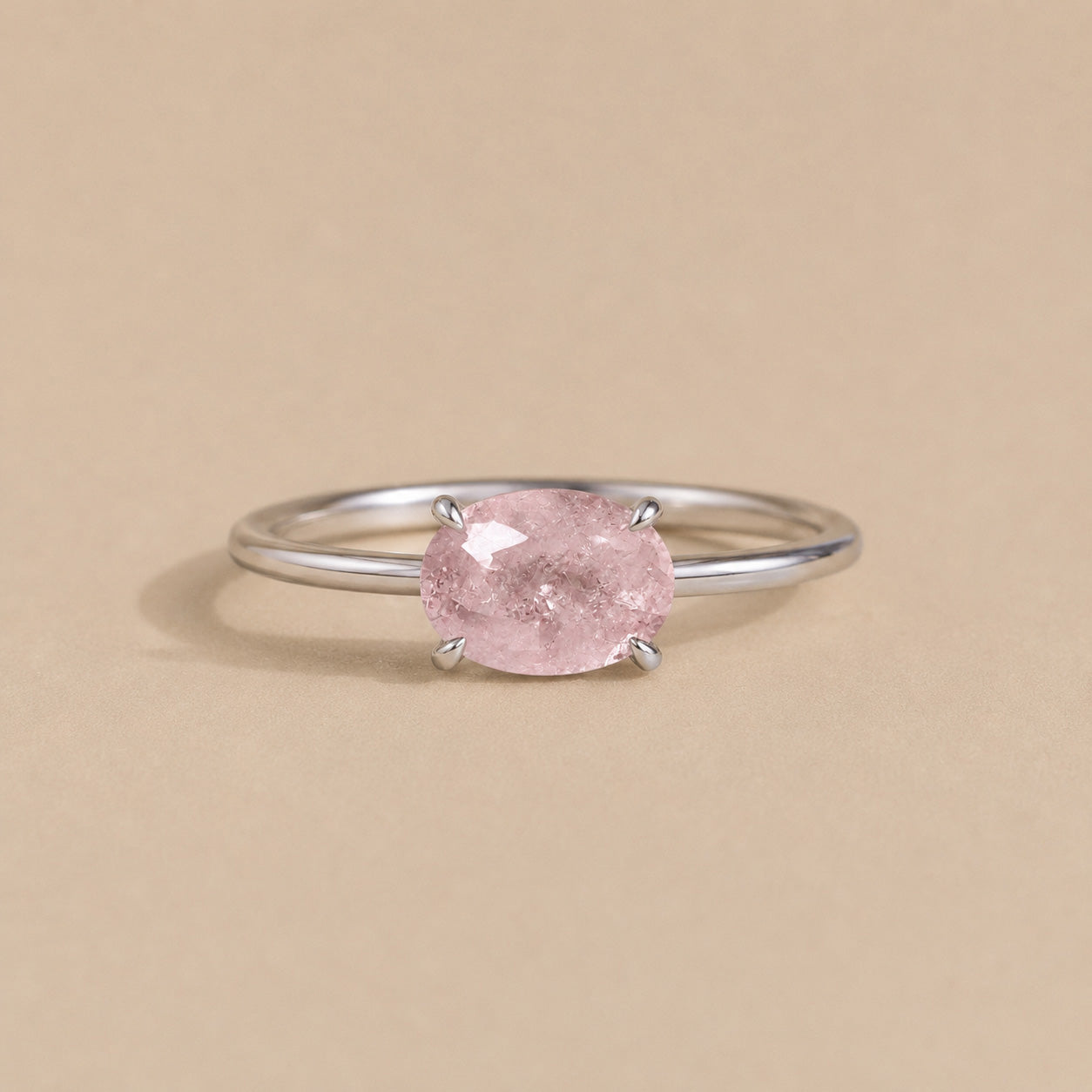Aurora Ring handcrafted in solid 925 sterling silver featuring a natural oval pink morganite in a four-claw solitaire setting by Ryã Atelier.