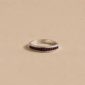 The Izimbewu Garnet Ring from Rya Atelier. Garnet beads set in a solid sterling silver pod ring. 