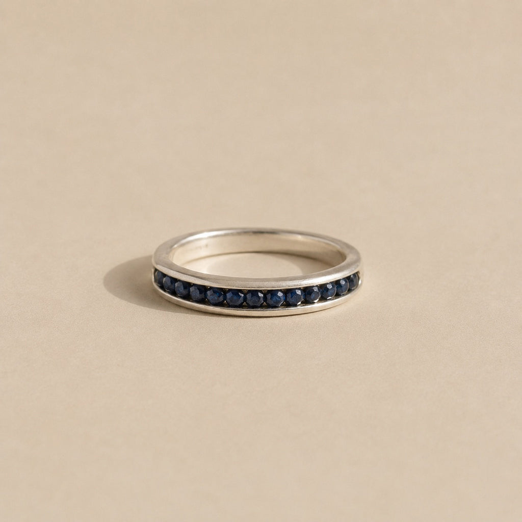 The Izimbewu Sapphire Ring from Rya Atelier. Sapphire beads set in a solid sterling silver pod ring. 