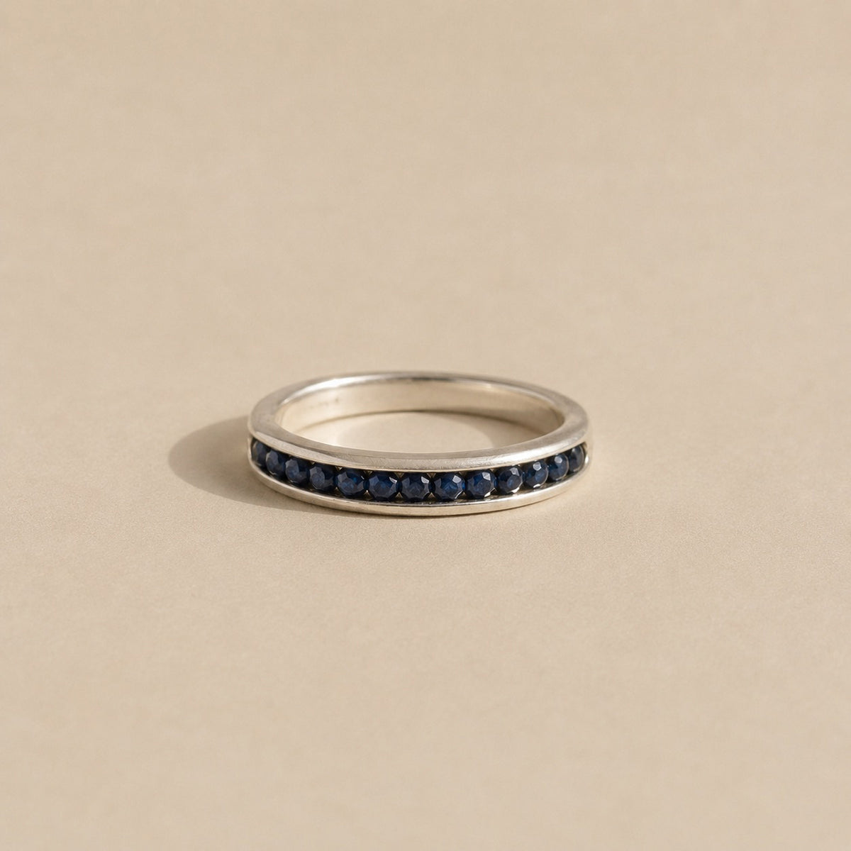 The Izimbewu Sapphire Ring from Rya Atelier. Sapphire beads set in a solid sterling silver pod ring. 