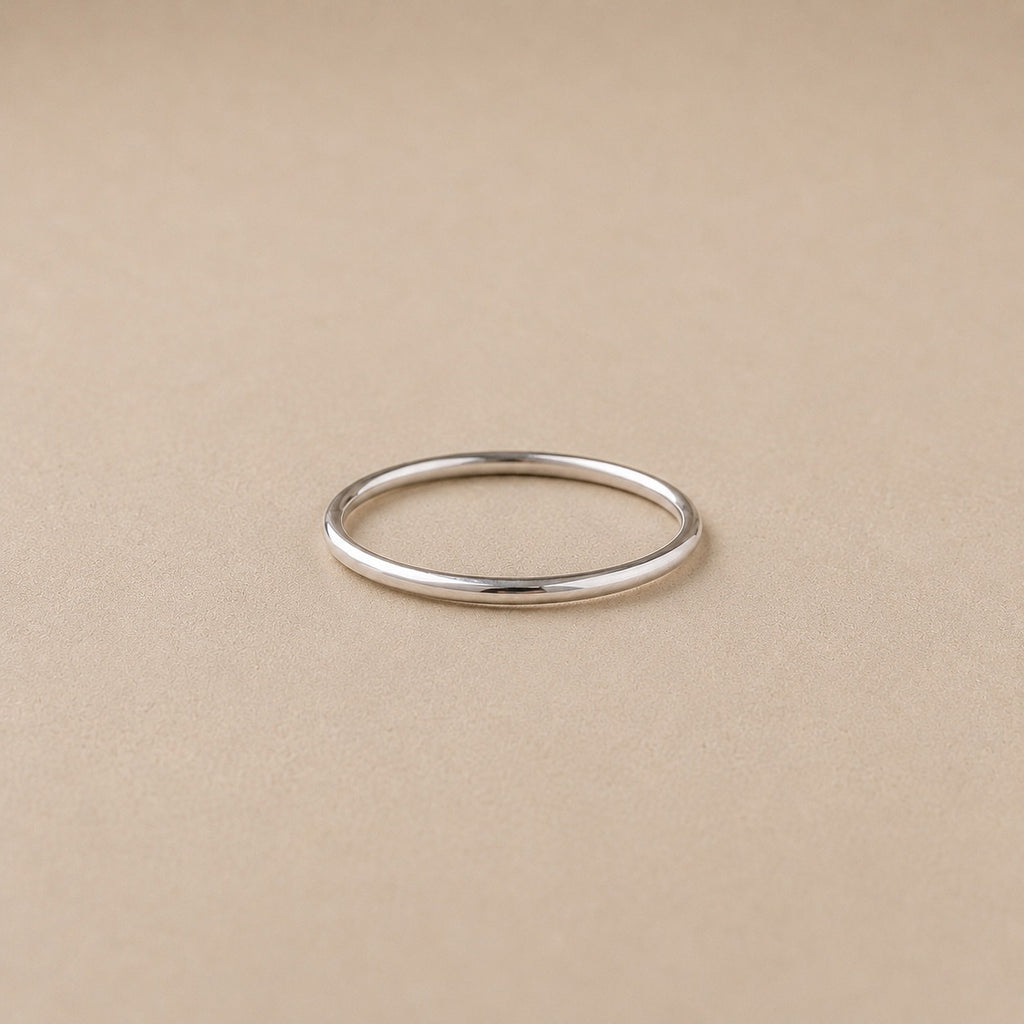 The Lesedi Ring Handcrafted in solid 925 sterling Silver with beige background