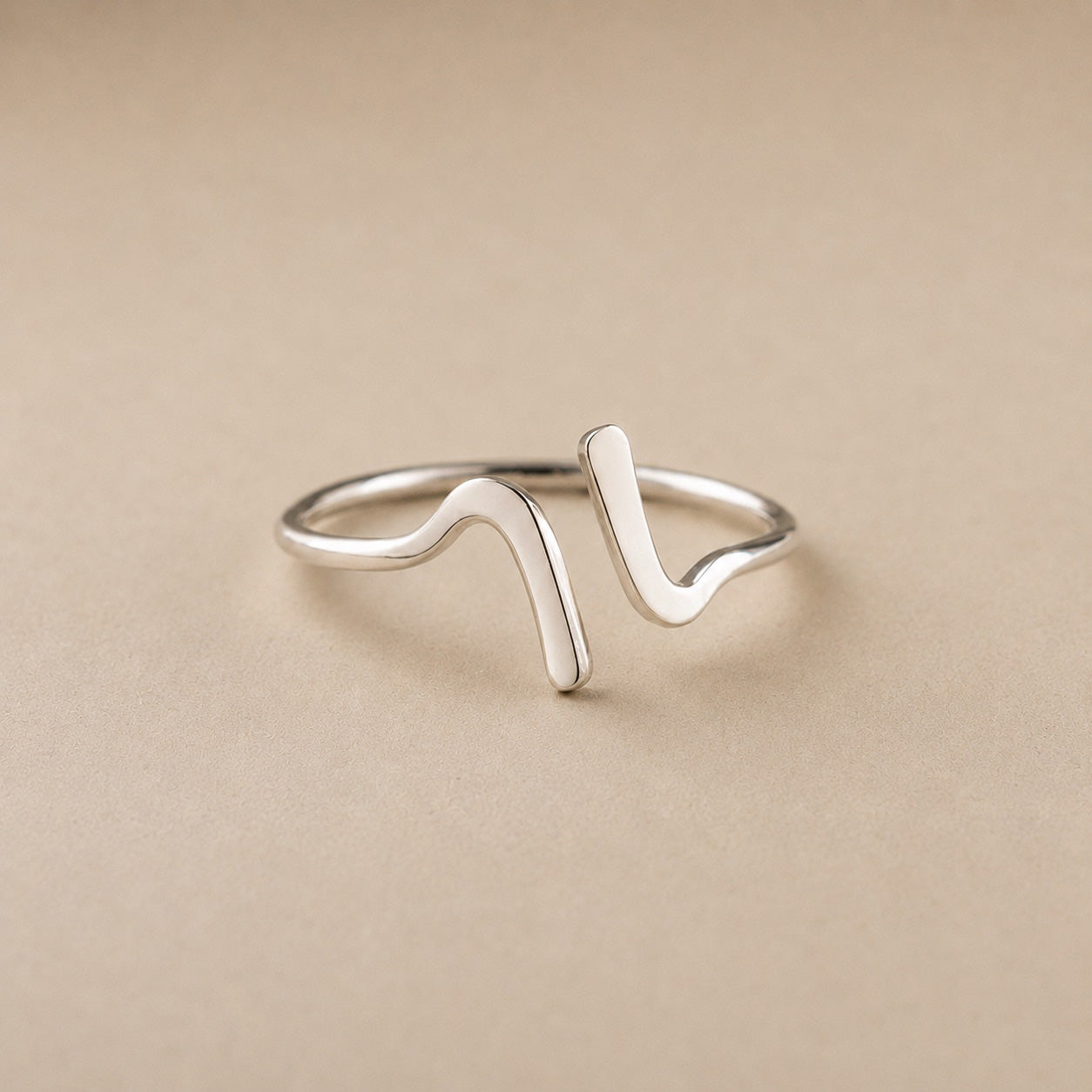 Lila Ring handcrafted in solid 925 sterling silver featuring a minimalist sculptural wave design by Ryã Atelier.