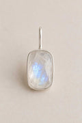 Stadium shaped Unyezi Moonstone pendant by Rya Atelier. Faceted Rainbow Moonstone set in solid 925 sterling silver. 
