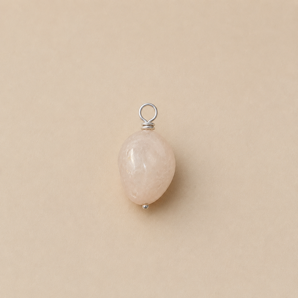 Rosa Pendant, from Rya Atelier, handcrafted from a natural Rose Quartz drop bead with a sterling silver ball head pin and round pendant loop. Oval natural rose quartz. 