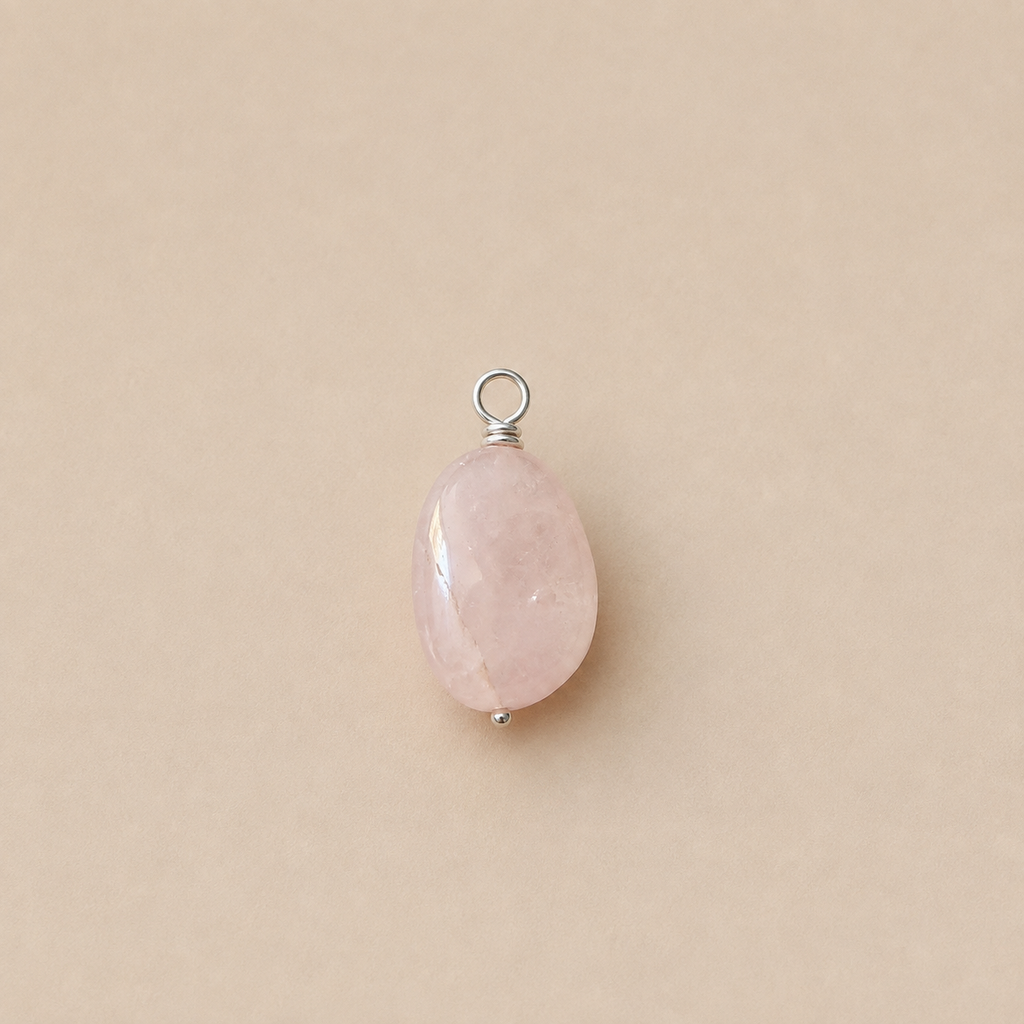 Rosa Pendant, from Rya Atelier, handcrafted from a natural Rose Quartz drop bead with a sterling silver ball head pin and round pendant loop. Small pendant with inclusions.