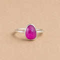 Thabisa Ring handcrafted in solid 925 sterling silver featuring a natural pear cut pink ruby in a bezel setting by Ryã Atelier.