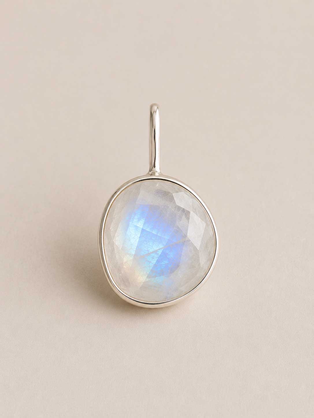 Cobble shaped Unyezi Moonstone pendant by Rya Atelier. Faceted Rainbow Moonstone set in solid 925 sterling silver. 