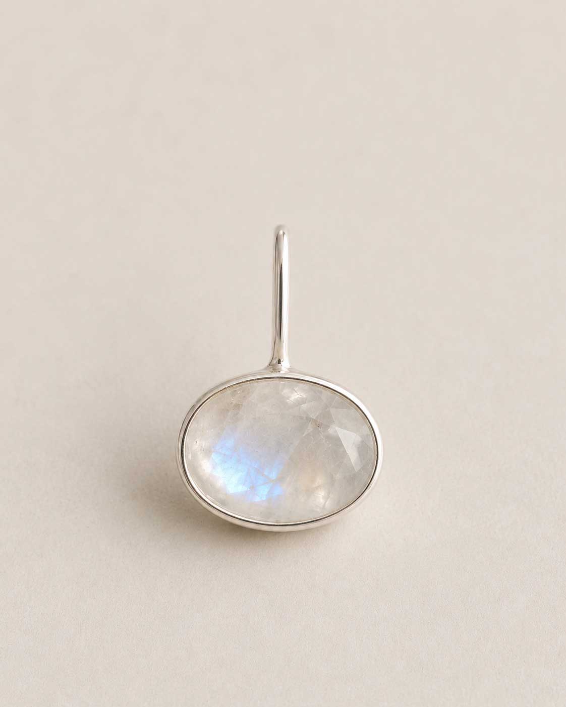 Landscape Oval shaped Unyezi Moonstone pendant by Rya Atelier. Faceted Rainbow Moonstone set in solid 925 sterling silver. 