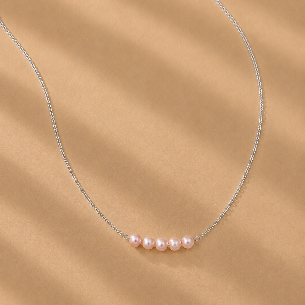 Vivienne Pink Pearl Necklace by Ryã Atelier featuring five Pink-toned 5mm freshwater pearls on a fine sterling silver chain