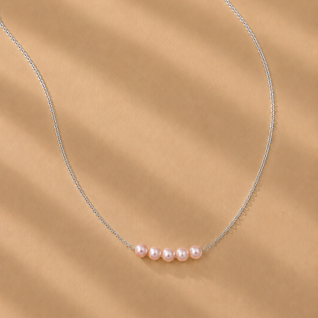 Vivienne Pink Pearl Necklace by Ryã Atelier featuring five Pink-toned 5mm freshwater pearls on a fine sterling silver chain